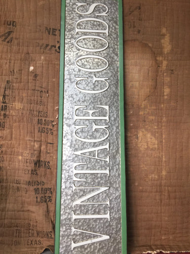 “Vintage Goods” sign